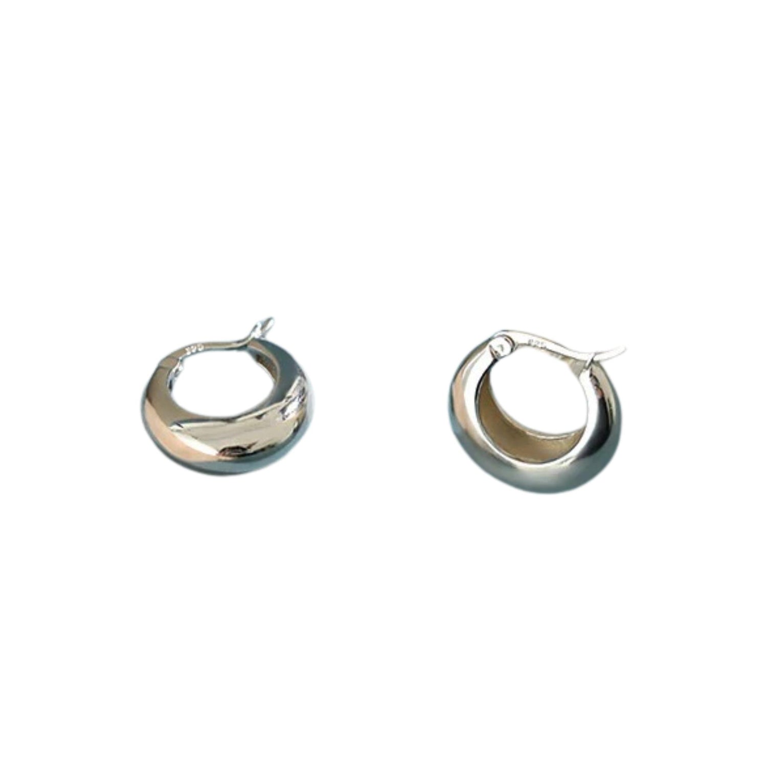 GEOMETRIC CIRCLE EARRINGS (الأقراط)