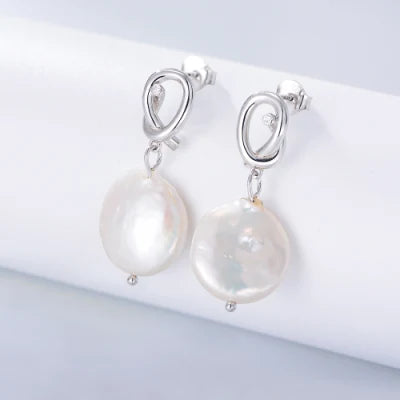 KNOT DANGLE FRESH WATER PEARL STUD EARRINGS (الأقراط)