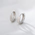 GLOSSY STRIPE ROUND HUGGIE EARRINGS (الأقراط)