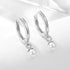PEARL HOOP EARRINGS (الأقراط)