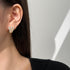 THREE CLAWS HOOP EARRINGS (الأقراط)