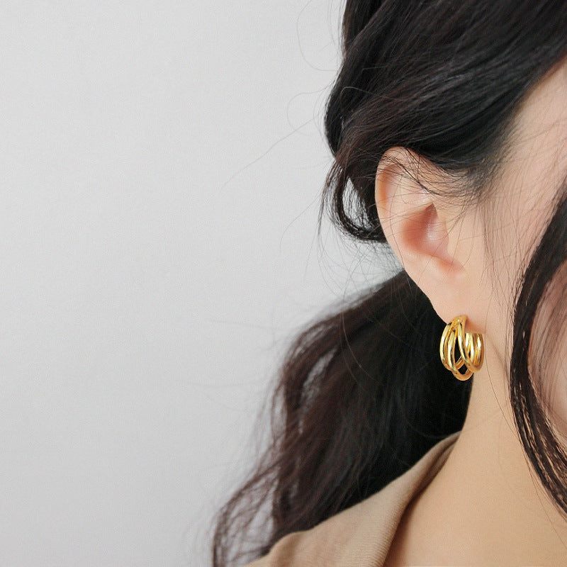 LINE-GEOMETRIC MULTI-LAYER CIRCLE STUD EARRINGS (الأقراط)