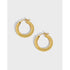 GEOMETRIC CIRCLE TEXTURE EARRINGS (الأقراط)