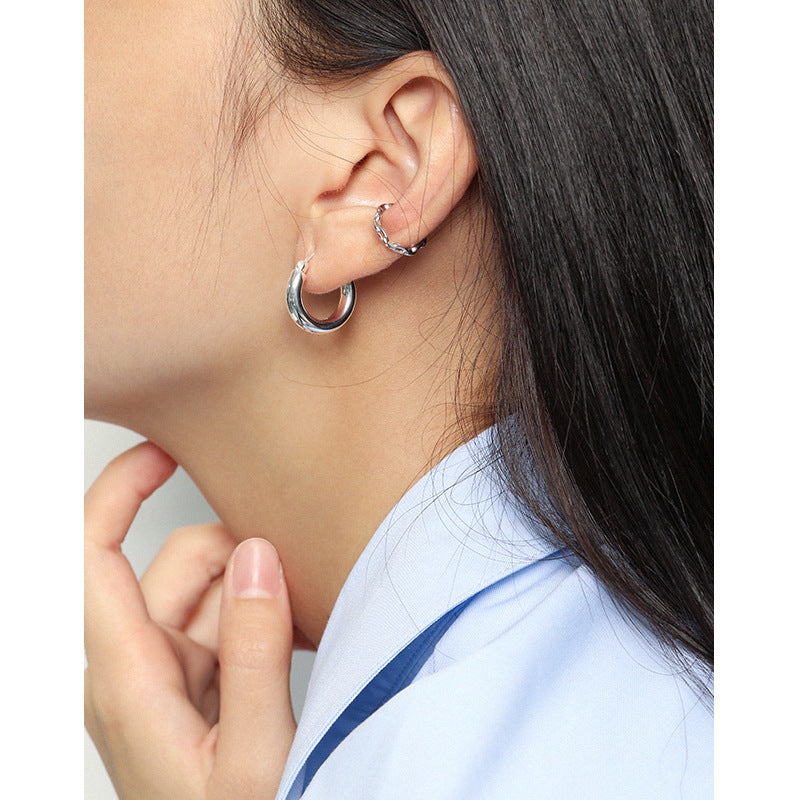 GEOMETRIC CIRCLE TEXTURE EARRINGS (الأقراط)