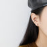 IRREGULAR WAVY EAR BUCKLE EARRINGS (الأقراط)