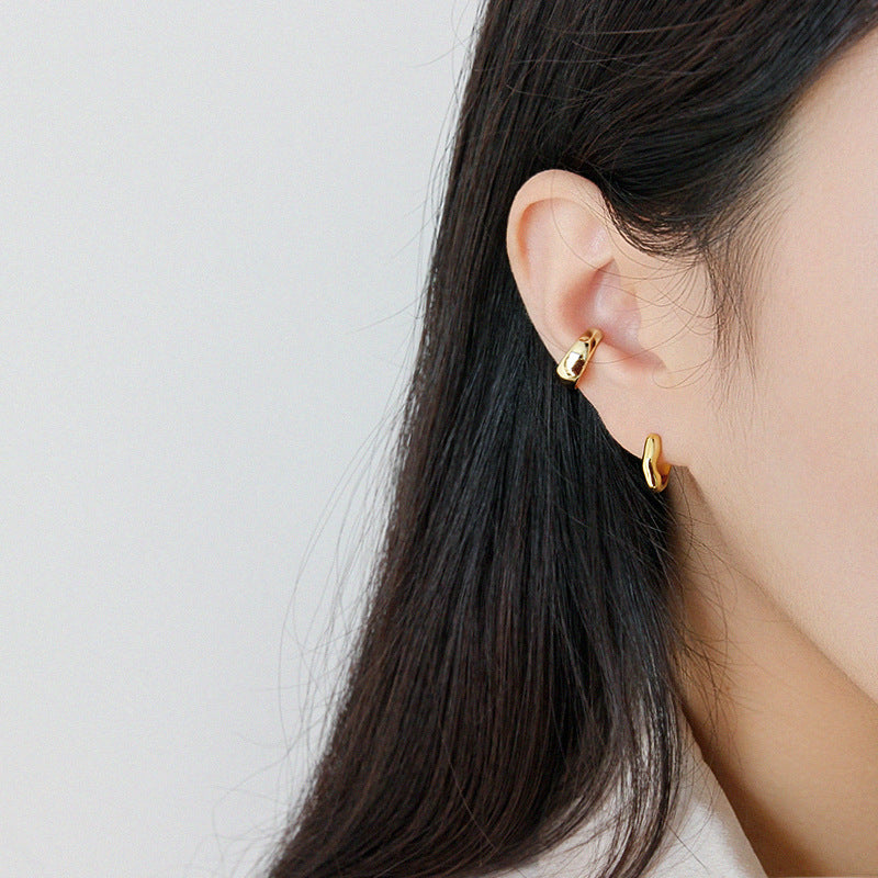 IRREGULAR WAVY EAR BUCKLE EARRINGS (الأقراط)