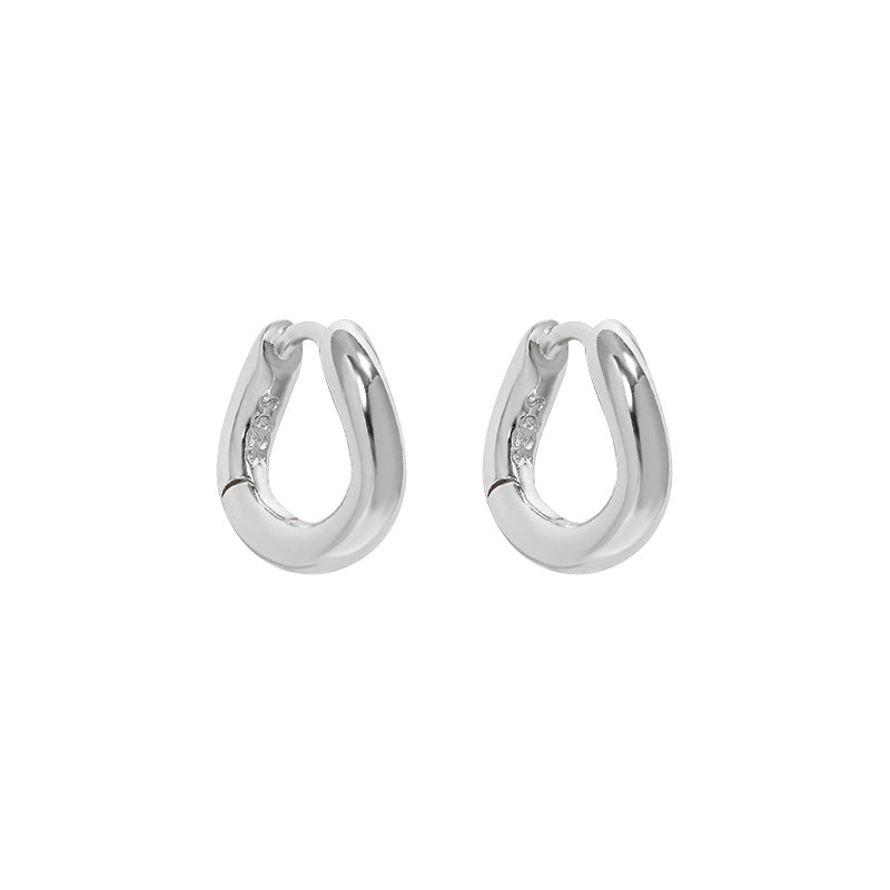 IRREGULAR CIRCLE BUCKLE EARRINGS (الأقراط)