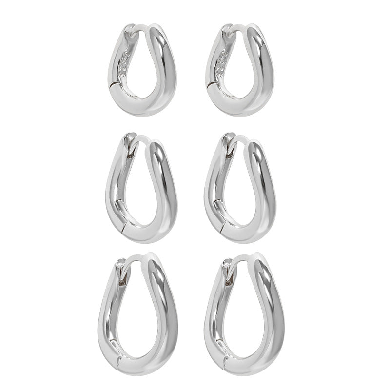 IRREGULAR CIRCLE BUCKLE EARRINGS (الأقراط)