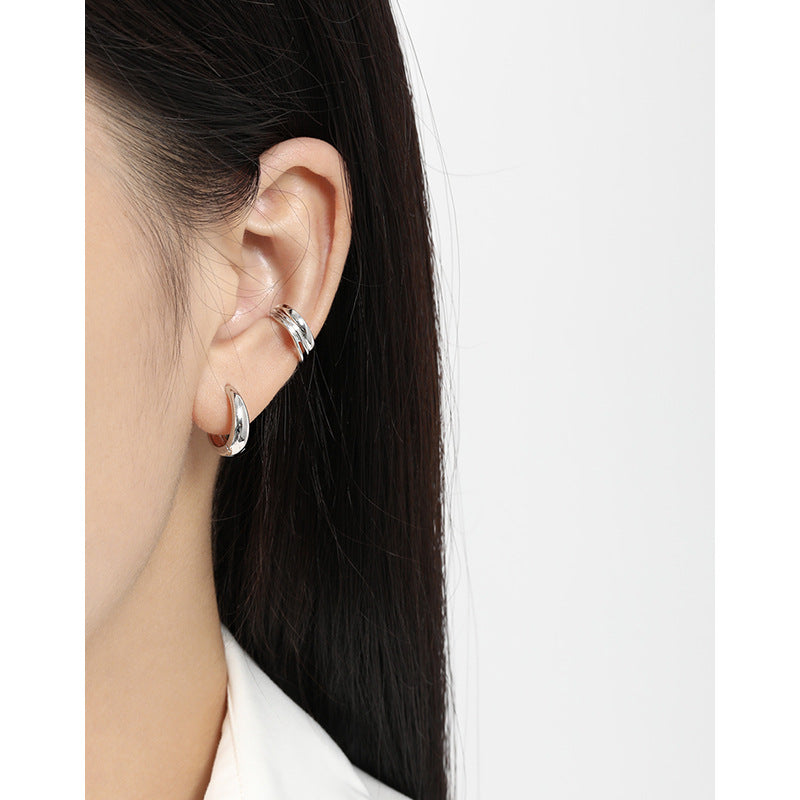 IRREGULAR CIRCLE BUCKLE EARRINGS (الأقراط)