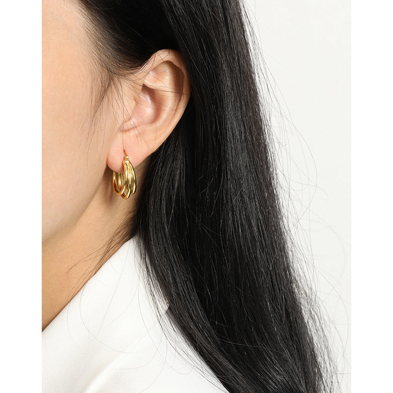 GEOMETRIC MULTI-LAYERED CIRCLE EARRINGS (الأقراط)