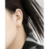 OVAL BUCKLE EARRINGS (الأقراط)