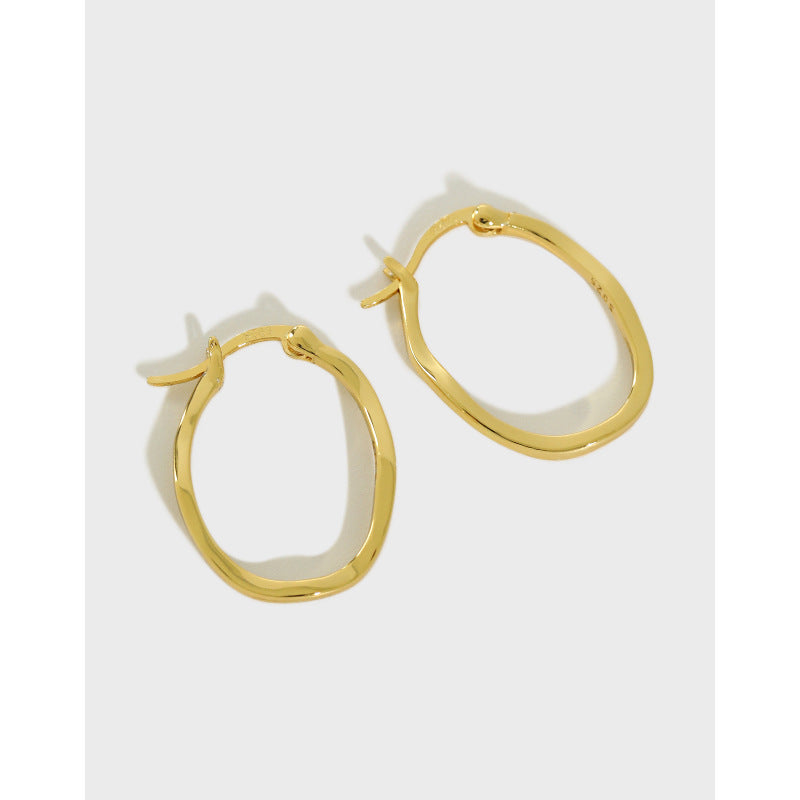 HAMMER GRAIN IRREGULAR ROUND EARRINGS (الأقراط)