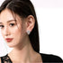 THREE CLAWS HOOP EARRINGS (الأقراط)